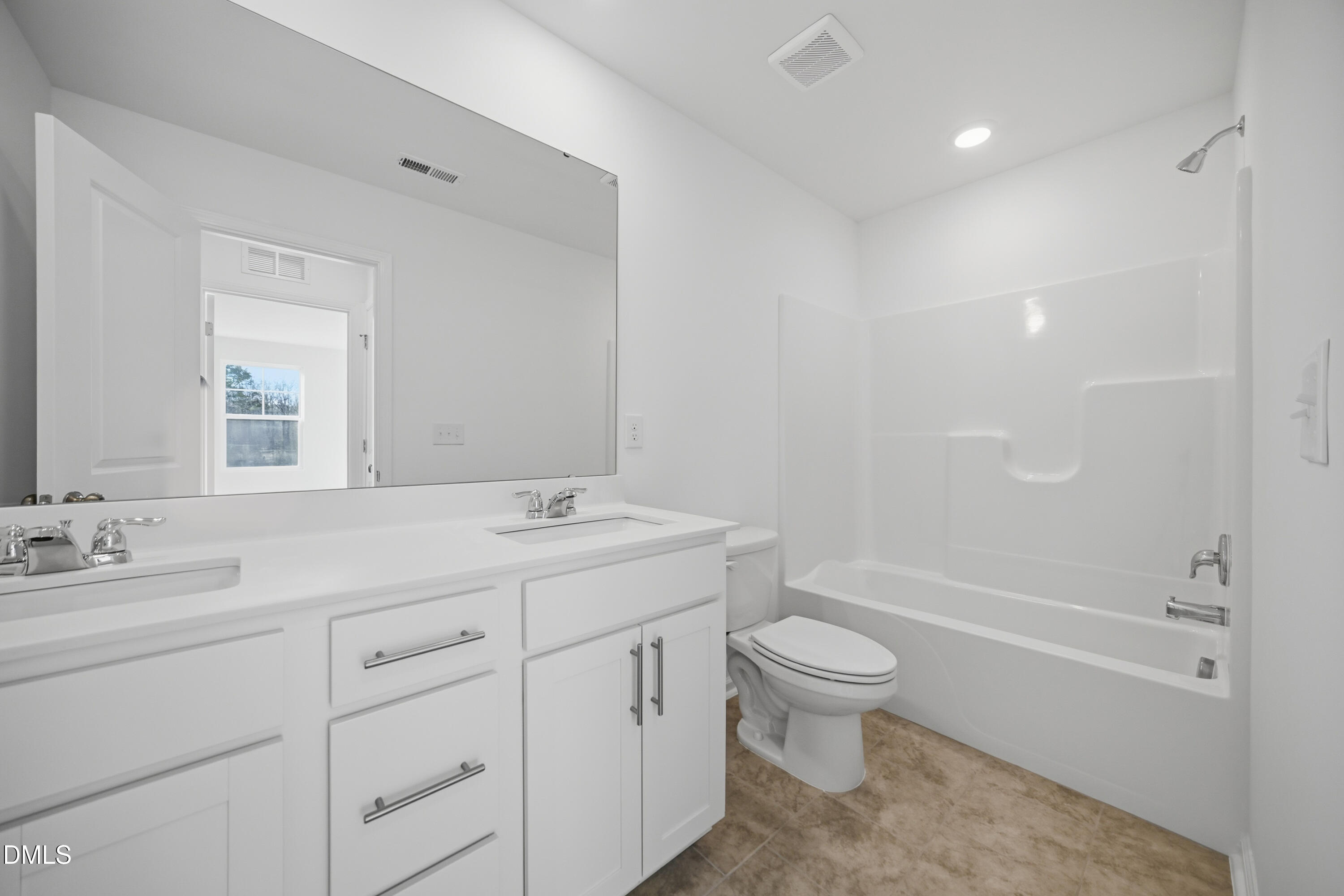 2915 Hickory Fld Drive Raleigh, NC 27616 - Photo 15 of 30 a bathroom with a sink a toilet and a mirror