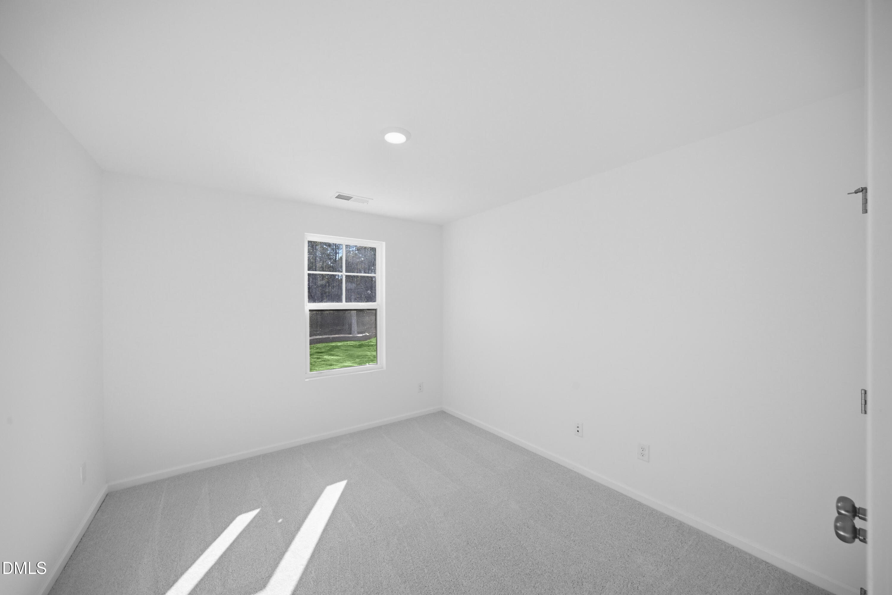 2915 Hickory Fld Drive Raleigh, NC 27616 - Photo 16 of 30 a view of an empty room with a window
