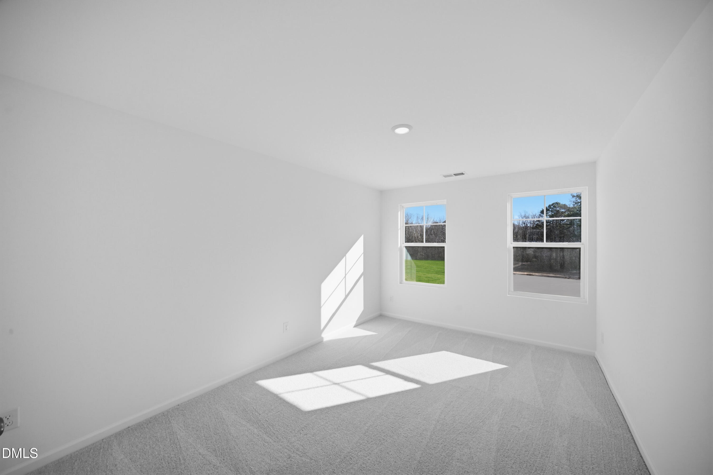 2915 Hickory Fld Drive Raleigh, NC 27616 - Photo 18 of 30 an empty room with windows
