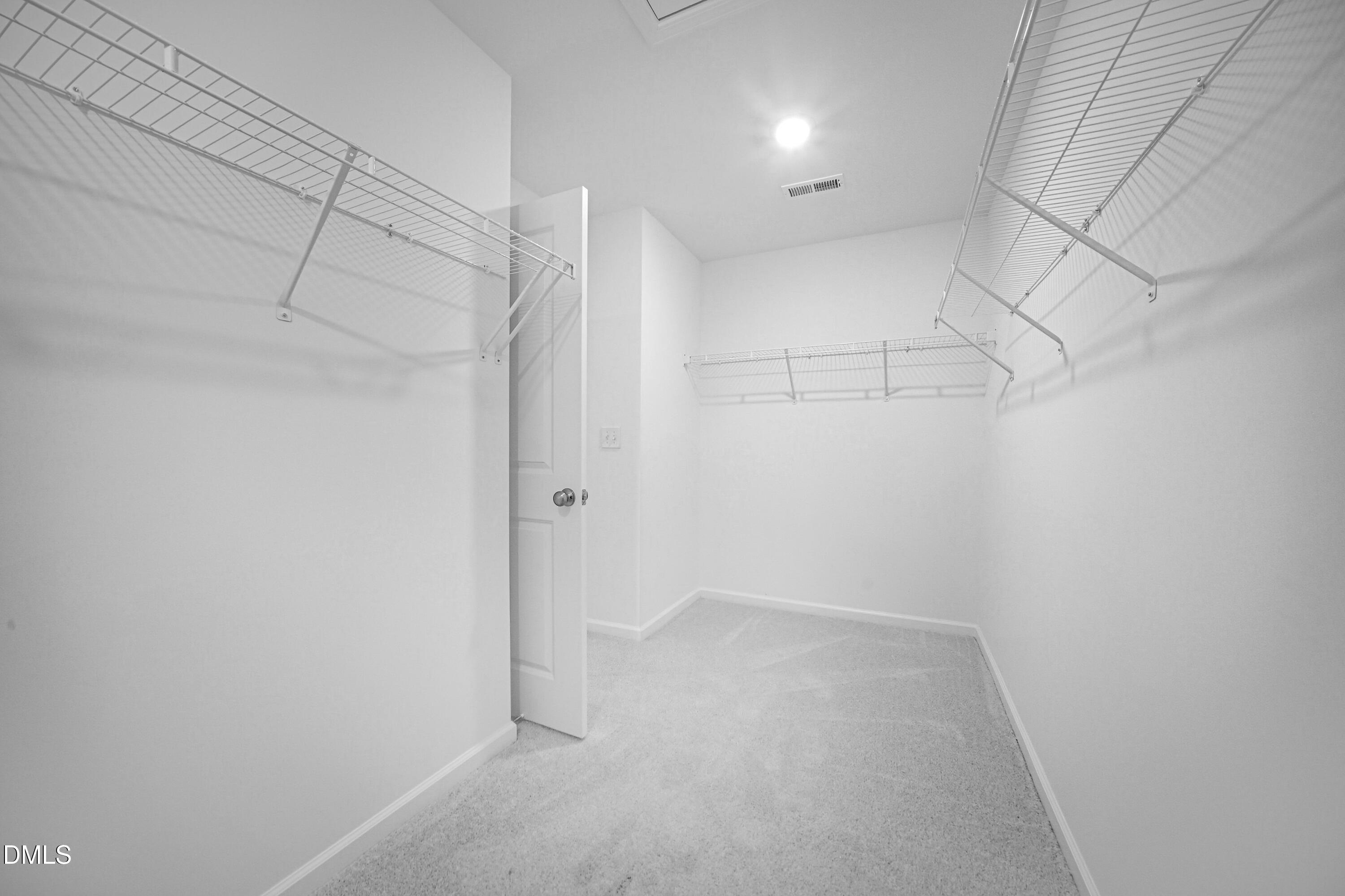 2915 Hickory Fld Drive Raleigh, NC 27616 - Photo 29 of 30 a view of a room with racks on the wall