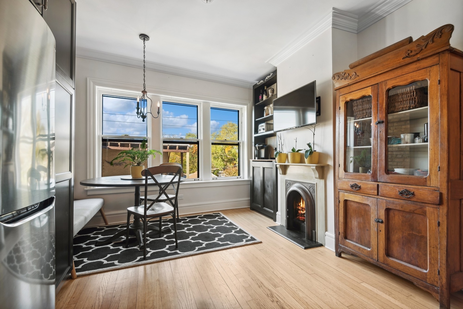 360 Ridge Avenue, Unit 102 Evanston, IL 60202 - Photo 9 of 16 a view of living room with furniture and a fireplace