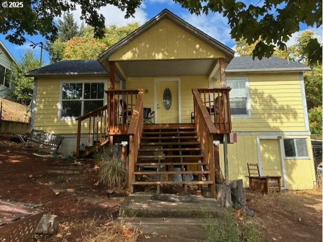 a front view of a house with a porch