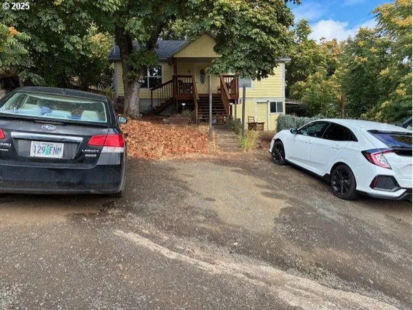 a car parked in front of a house