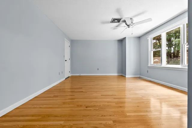 a view of small space with wooden floor