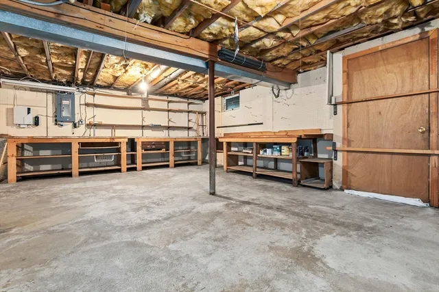 a view of a house with a yard and garage