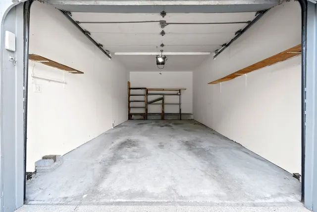 front view of a house with a garden