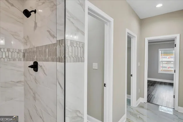 a view of a bathroom with a shower