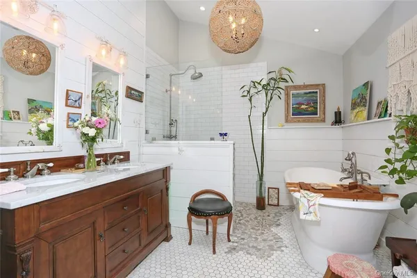 a bathroom with a toilet a sink and a mirror