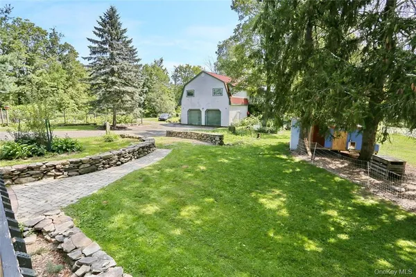 a house view with a garden space