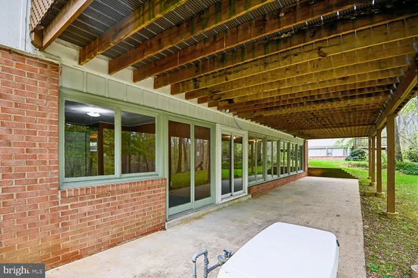a view of outdoor space with deck and garden