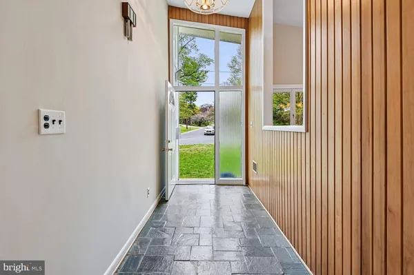 a view of entryway with a front door