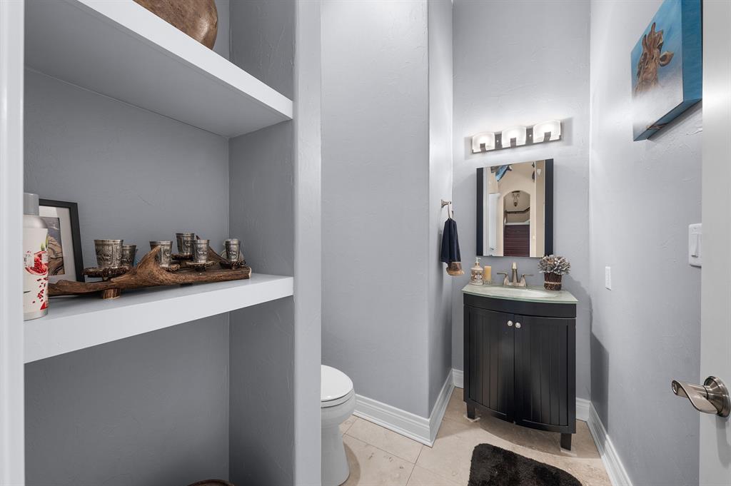 402 Cole Trail Sulphur Springs, TX 75482 - Photo 22 of 39 a bathroom with a sink a toilet and mirror