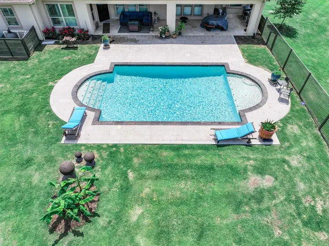 a view of a garden with an ocean