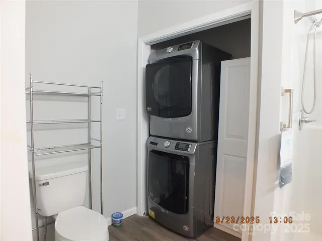 a bathroom with a toilet and a sink