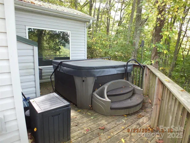 a view of balcony with a sink and outdoor seating