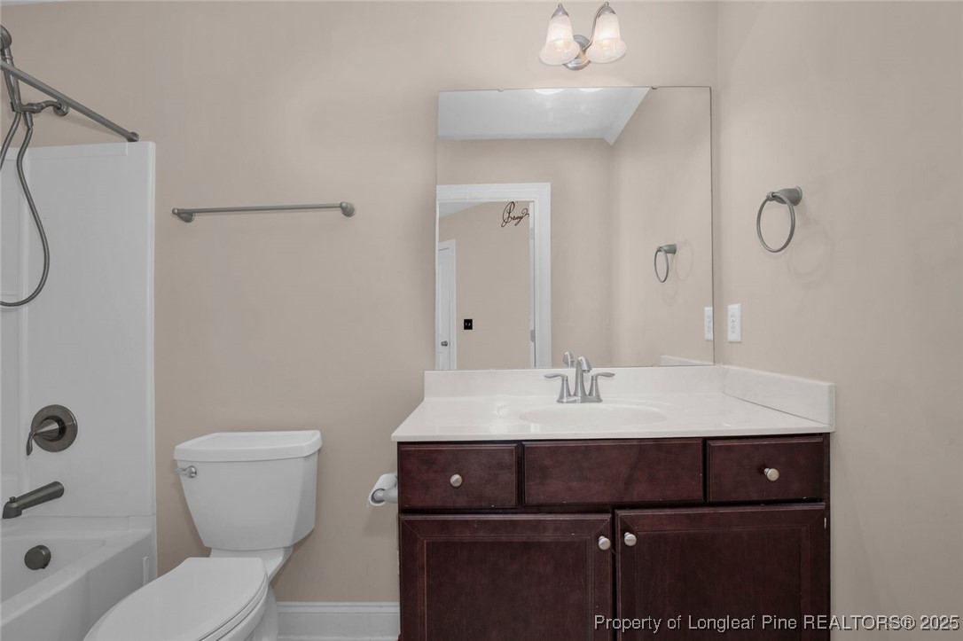 89 Revolutionary Road Cameron, NC 28326 - Photo 21 of 37 a bathroom with a sink a toilet and shower