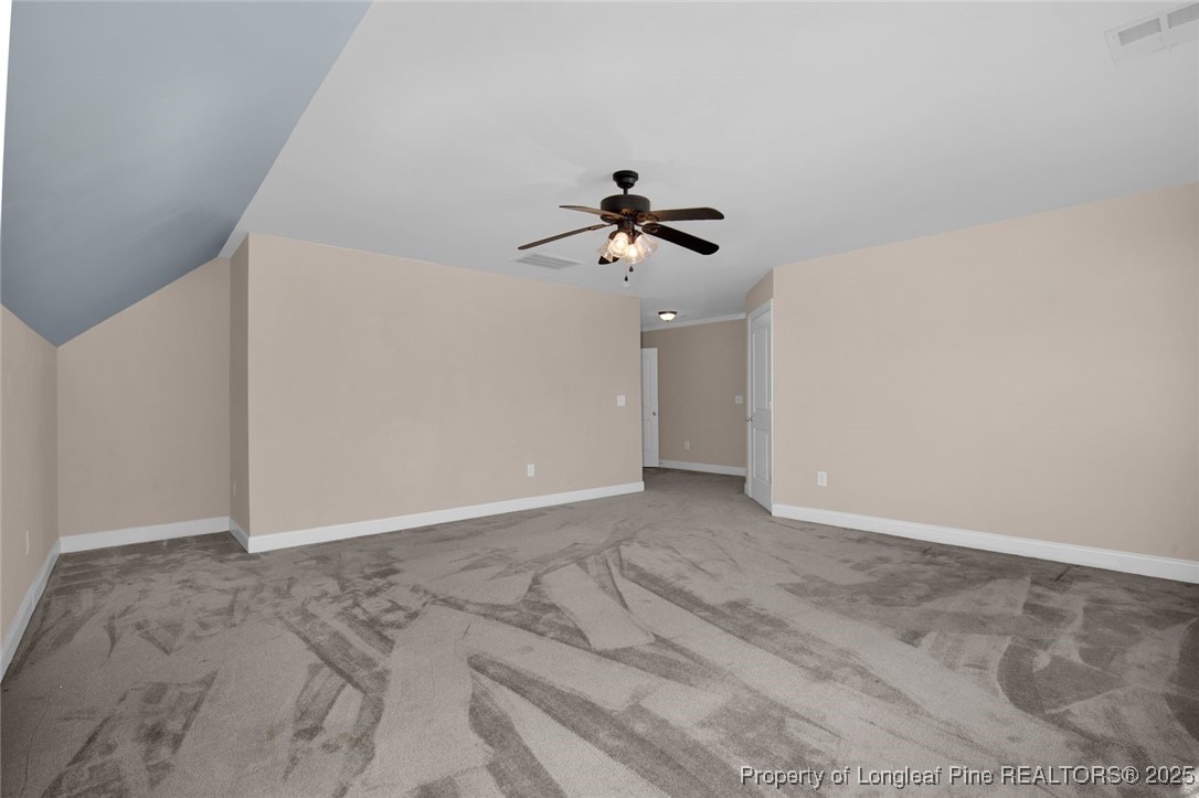 89 Revolutionary Road Cameron, NC 28326 - Photo 23 of 37 a view of a livingroom with a ceiling fan and window