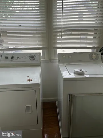 a bathroom with a sink and a window