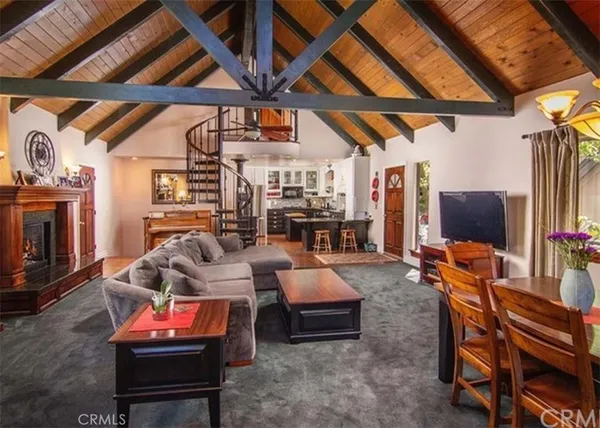 a outdoor living space with furniture and fireplace