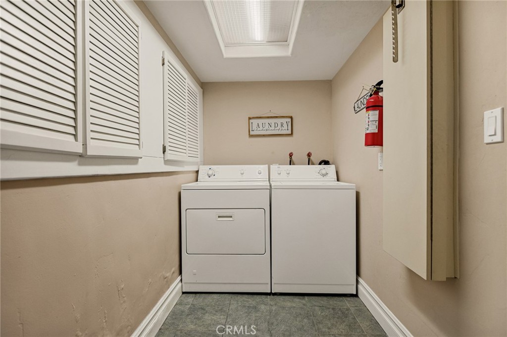 1055 Meadow Brook Road Lake Arrowhead, CA 92352 - Photo 22 of 27 a utility room with dryer and washer
