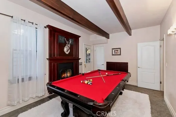 a room with a table and chairs