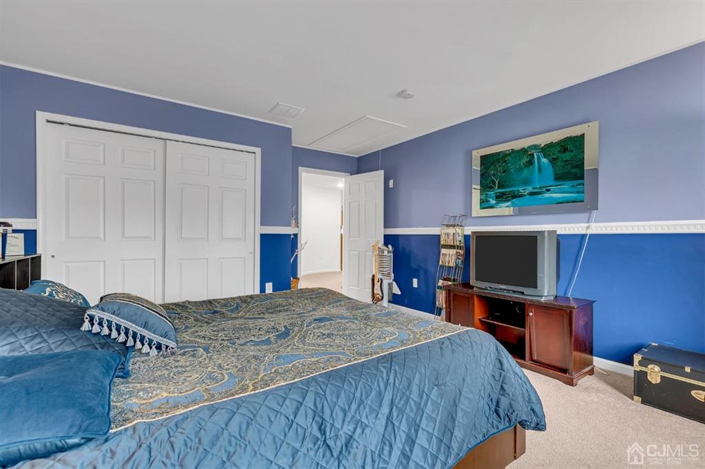 8 Risa Benjamin Way Freehold, NJ 07728 - Photo 46 of 63 Second floor bedroom with bright windows.