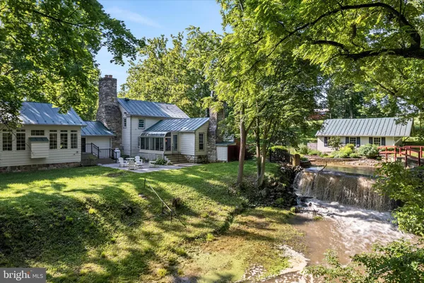 a bedroom with a bed and a walk in closet