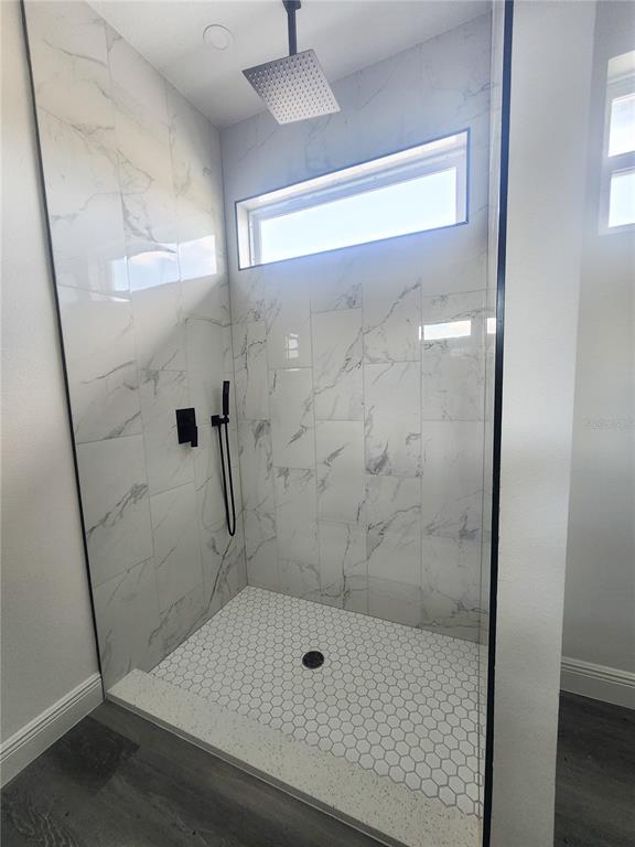 9483 Southwest 121st Terrace Dunnellon, FL 34432 - Photo 29 of 42 a bathroom with a shower