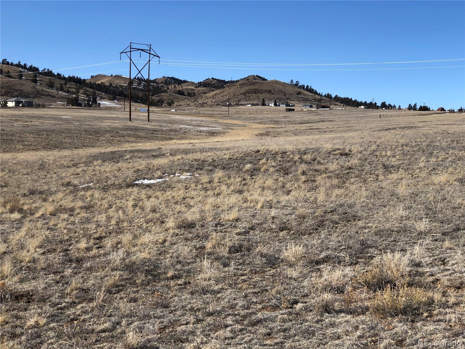 3209 Rio Blanco Road Hartsel, CO 80449 - Photo 11 of 20 a view of a dry yard with wooden fence