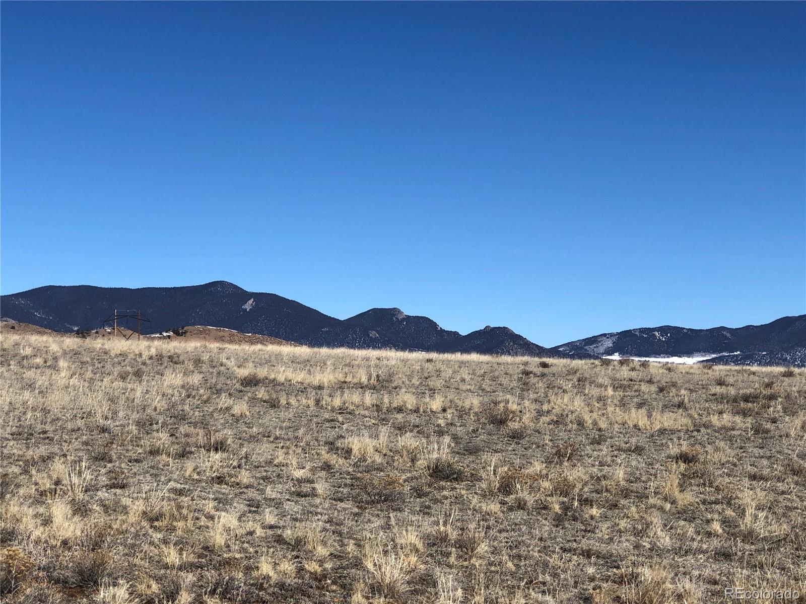 3209 Rio Blanco Road Hartsel, CO 80449 - Photo 12 of 20 a view of mountain with a city skyline in the background