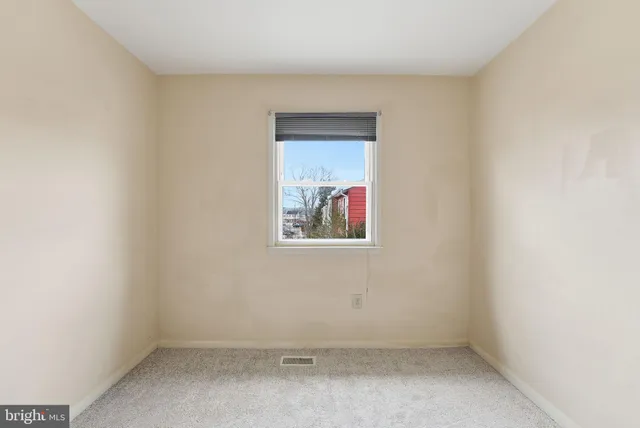 an empty room with a window