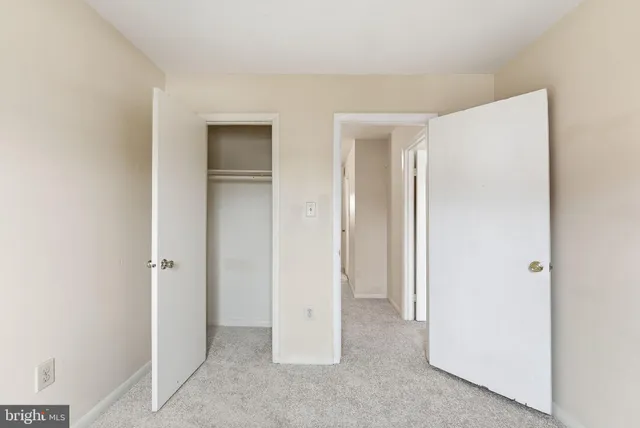 an empty room with closet