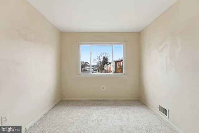 an empty room with a window