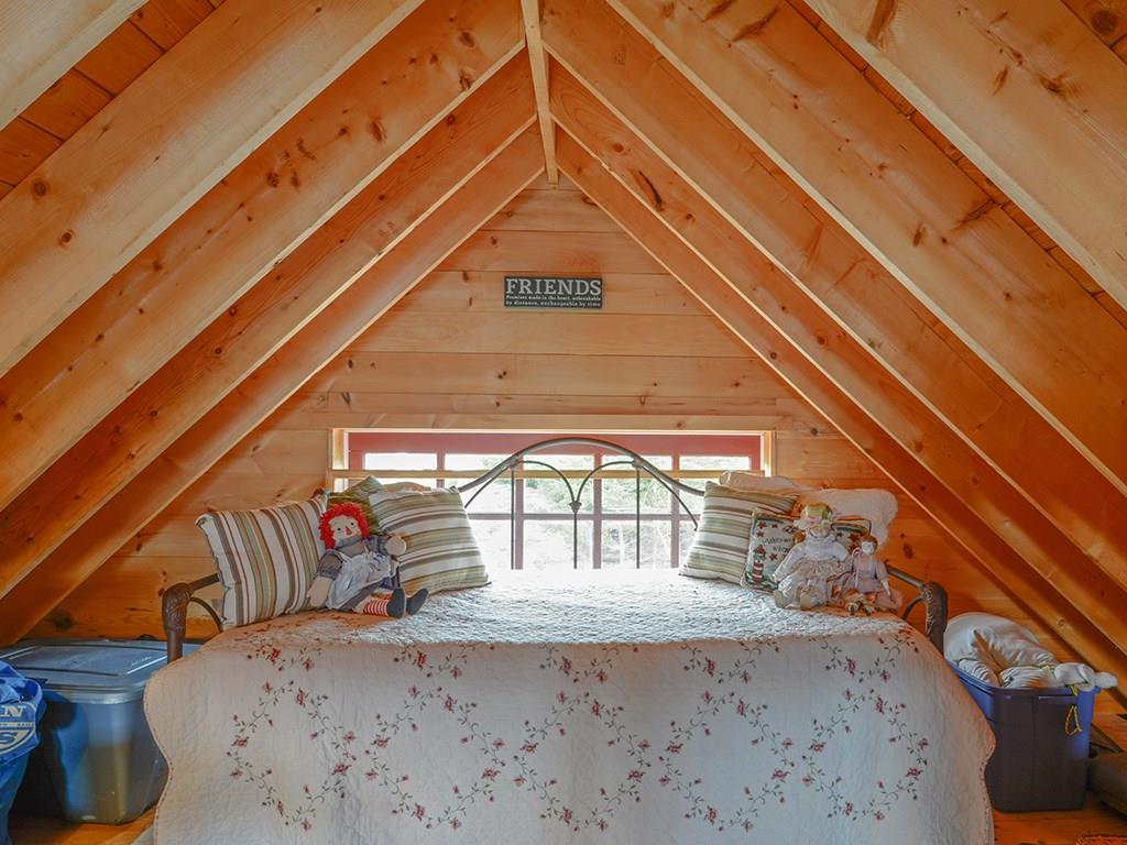 533 Jericho Bay Road Swans Island, ME 04685 - Photo 22 of 44 Loft with king size trundle bed.