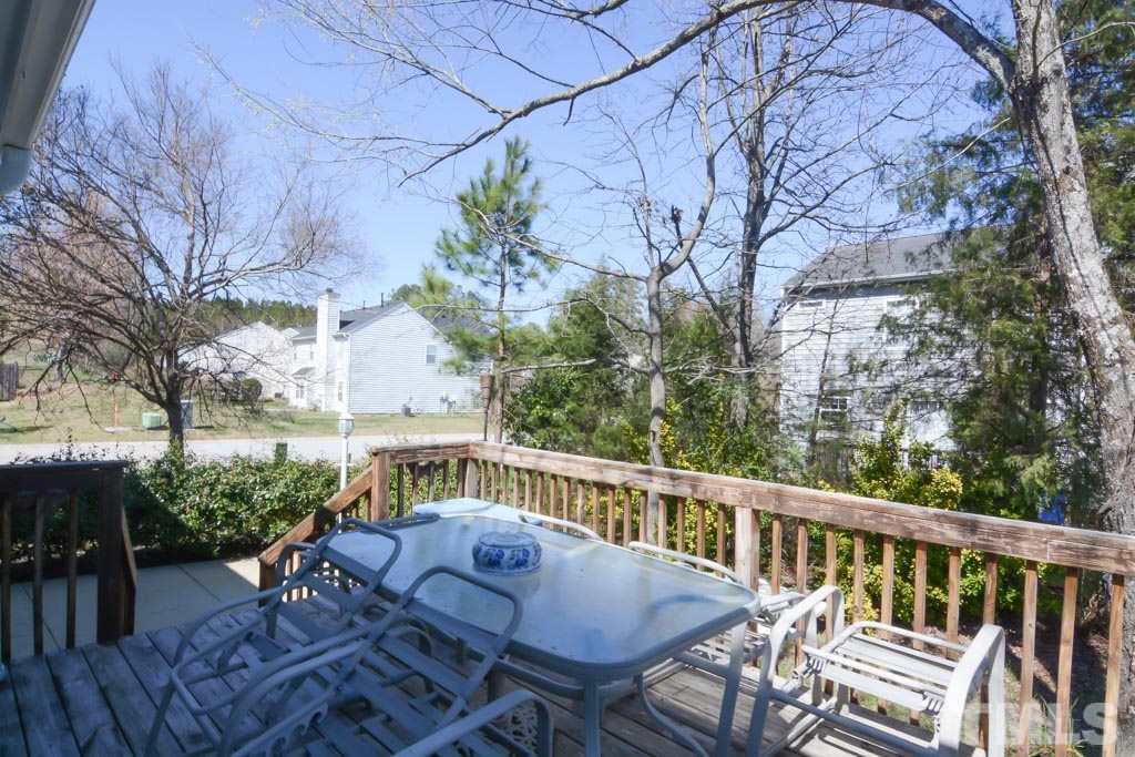 4601 Drewbridge Way Raleigh, NC 27604 - Photo 24 of 25 a view of balcony with furniture and trees