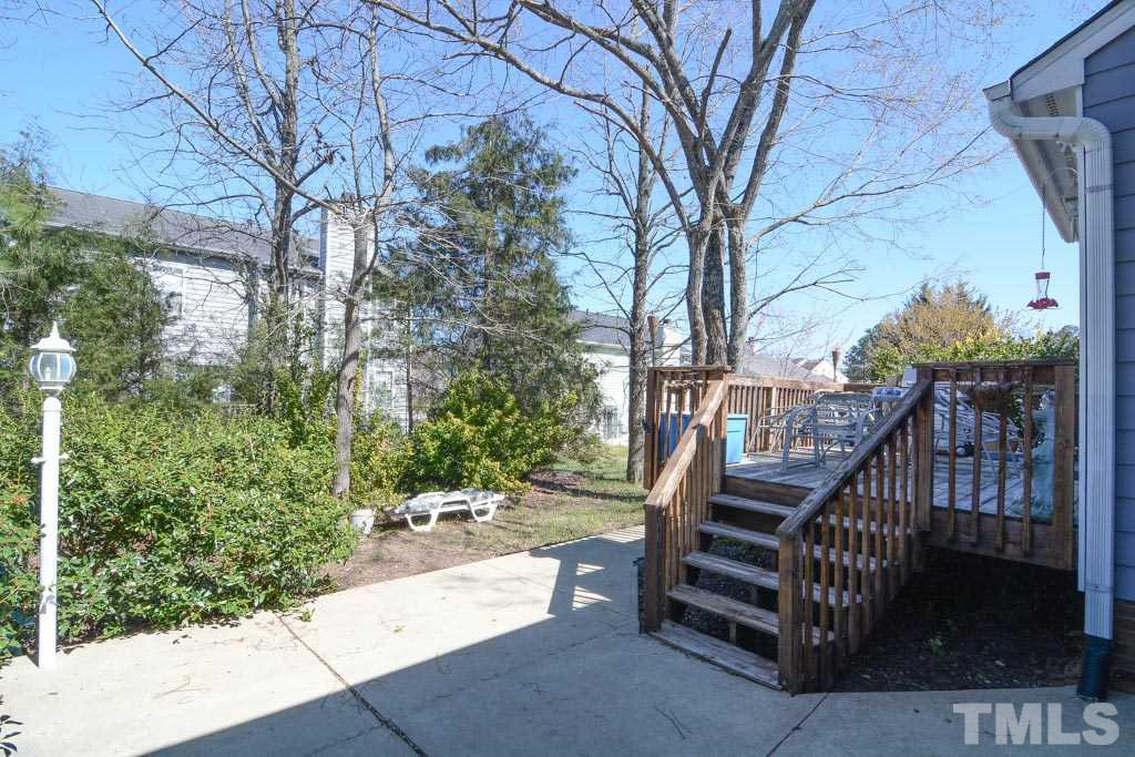 4601 Drewbridge Way Raleigh, NC 27604 - Photo 5 of 25 a view of deck with wooden floor and outdoor seating