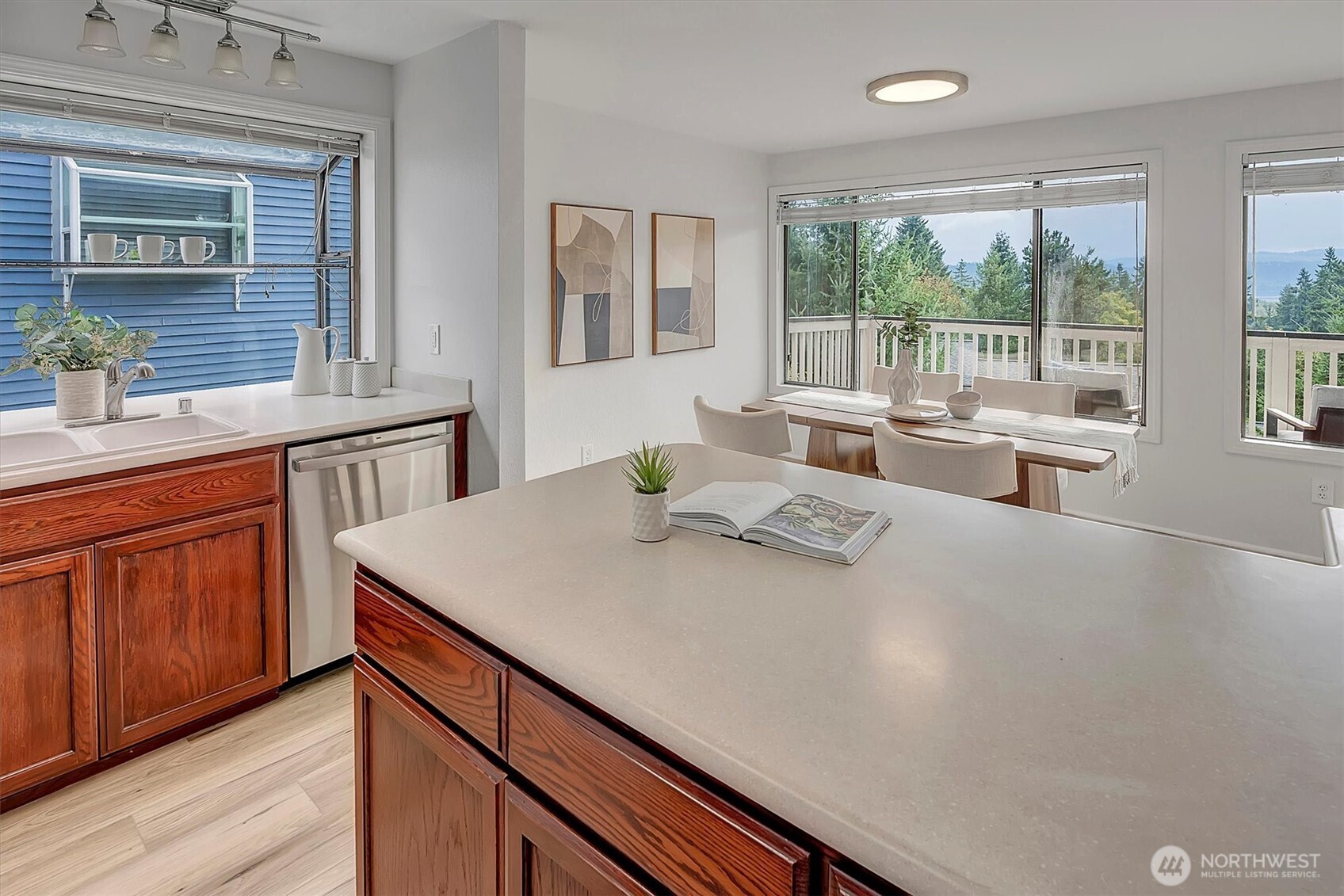 3410 161st Court Southeast, Unit 31 Bellevue, WA 98008 - Photo 11 of 25 a living room with stainless steel appliances furniture a large window and kitchen view