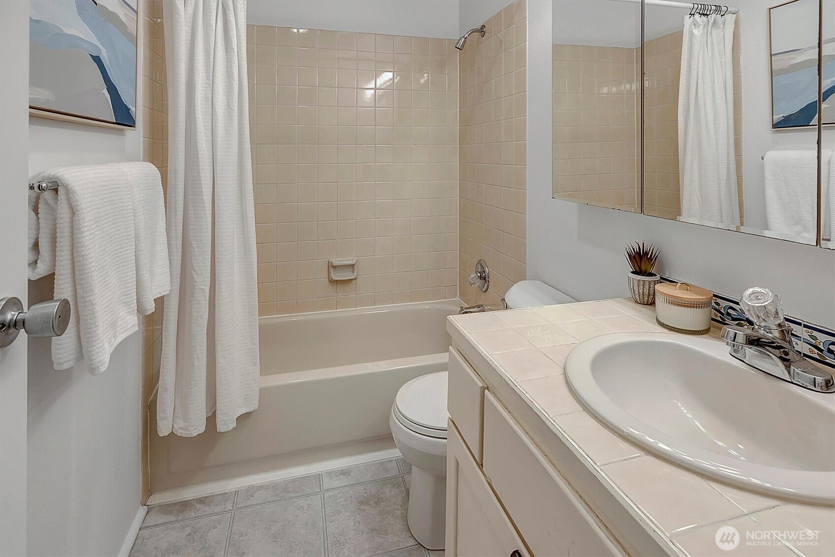 3410 161st Court Southeast, Unit 31 Bellevue, WA 98008 - Photo 19 of 25 a bathroom with a sink toilet and shower