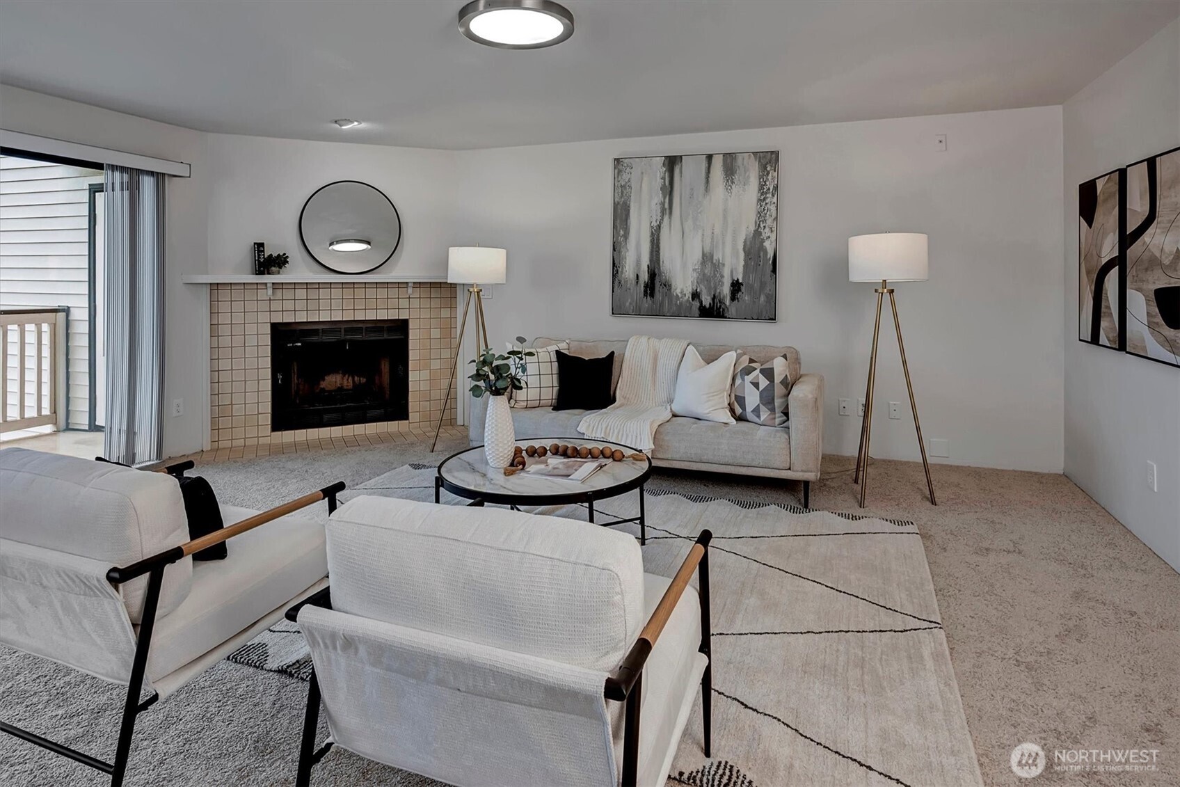 3410 161st Court Southeast, Unit 31 Bellevue, WA 98008 - Photo 4 of 25 a living room with furniture and a fireplace