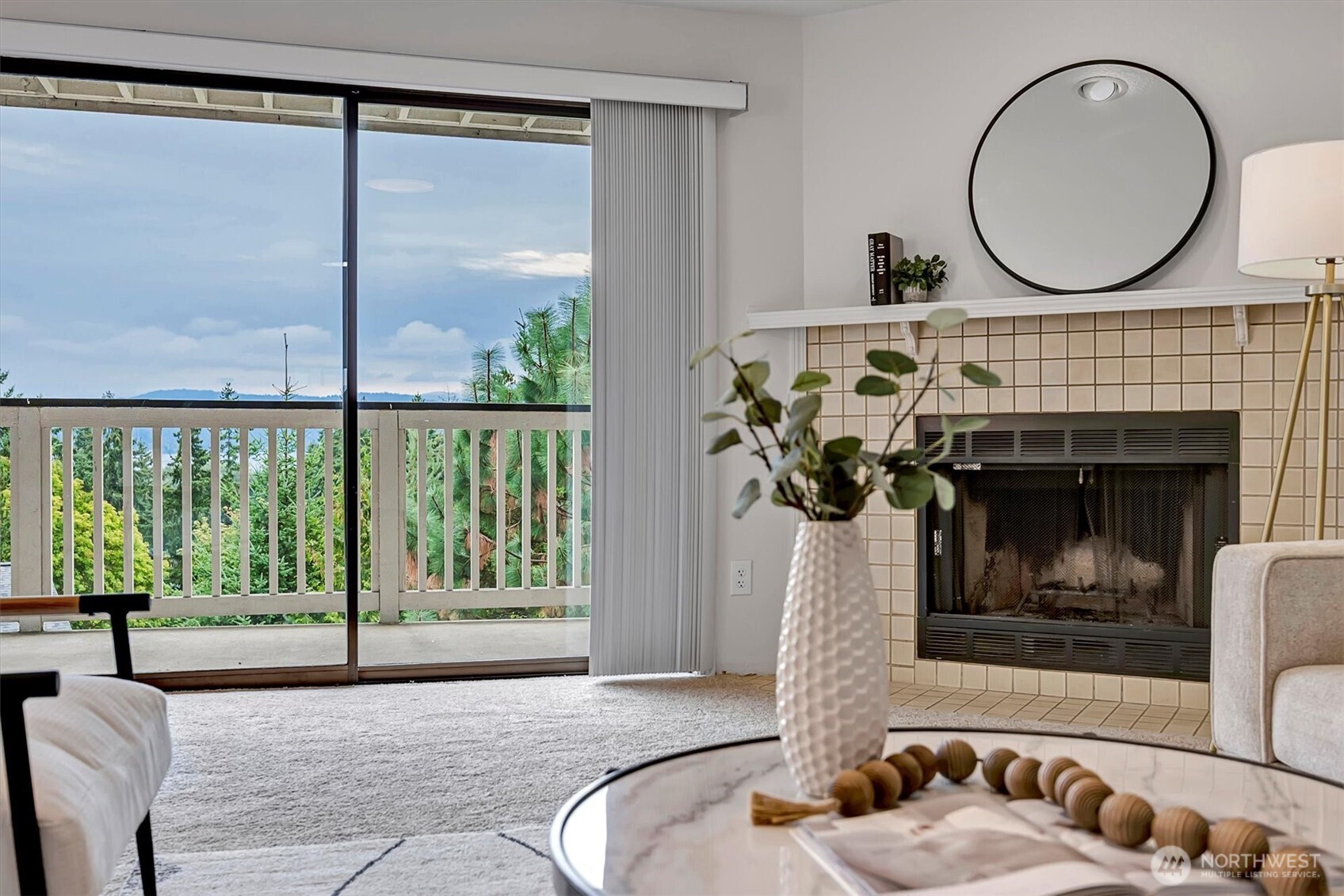 3410 161st Court Southeast, Unit 31 Bellevue, WA 98008 - Photo 6 of 25 a living room with furniture and a fireplace