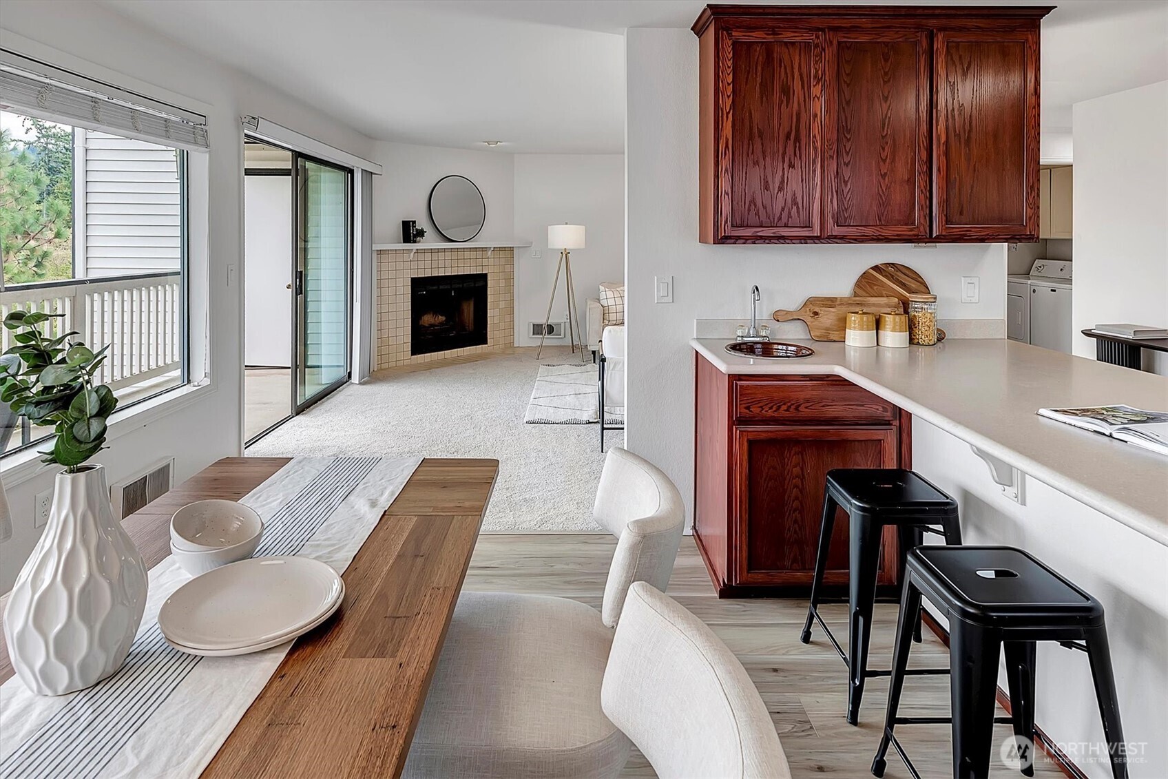 3410 161st Court Southeast, Unit 31 Bellevue, WA 98008 - Photo 7 of 25 a living room with furniture and a fireplace