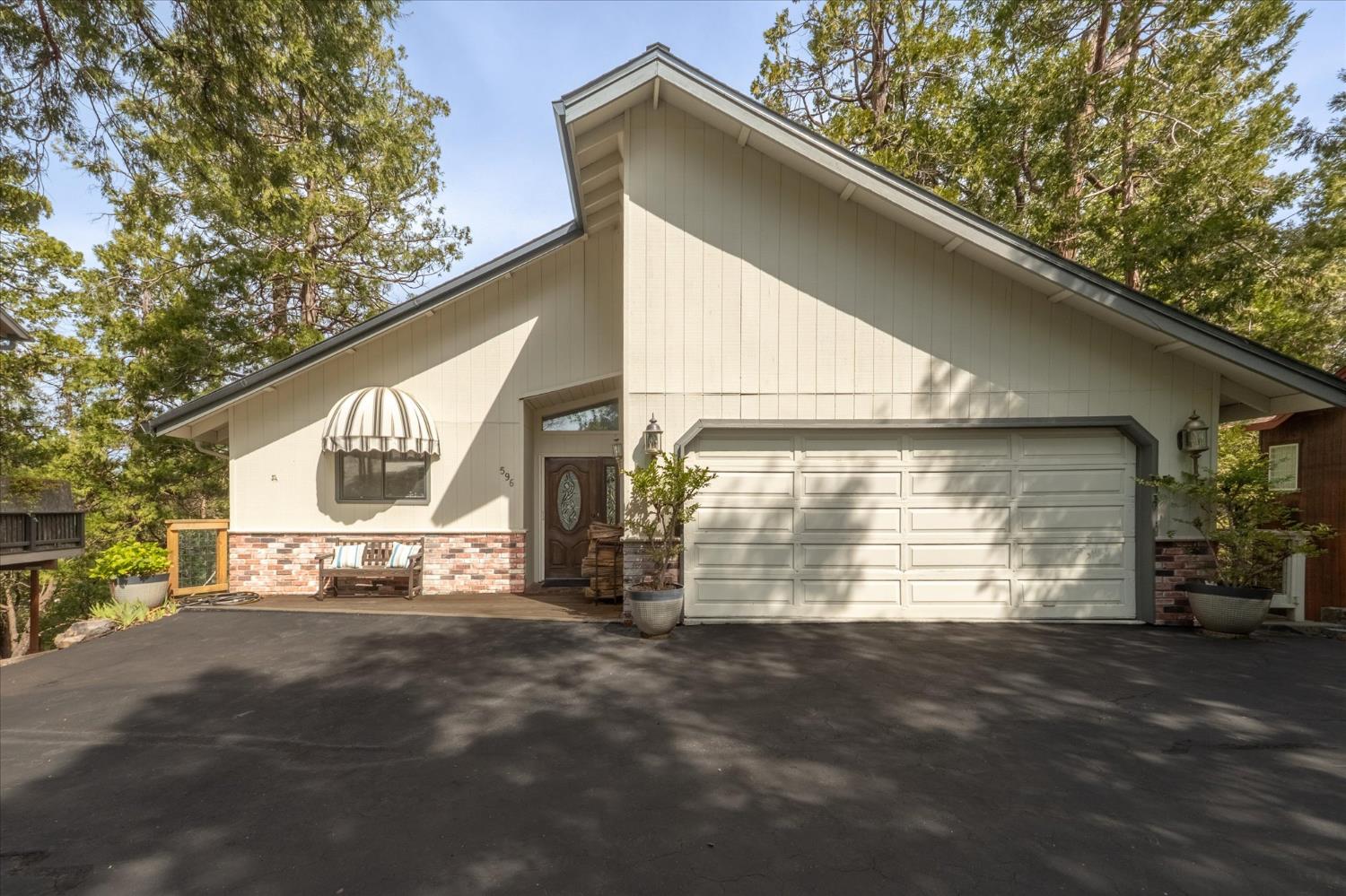 596 Sugarbush Lane Murphys, CA 95247 - Photo 2 of 48 a view of the house with a street