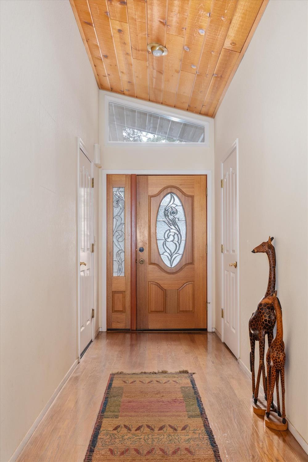 596 Sugarbush Lane Murphys, CA 95247 - Photo 21 of 48 a view of a hallway with wooden floor