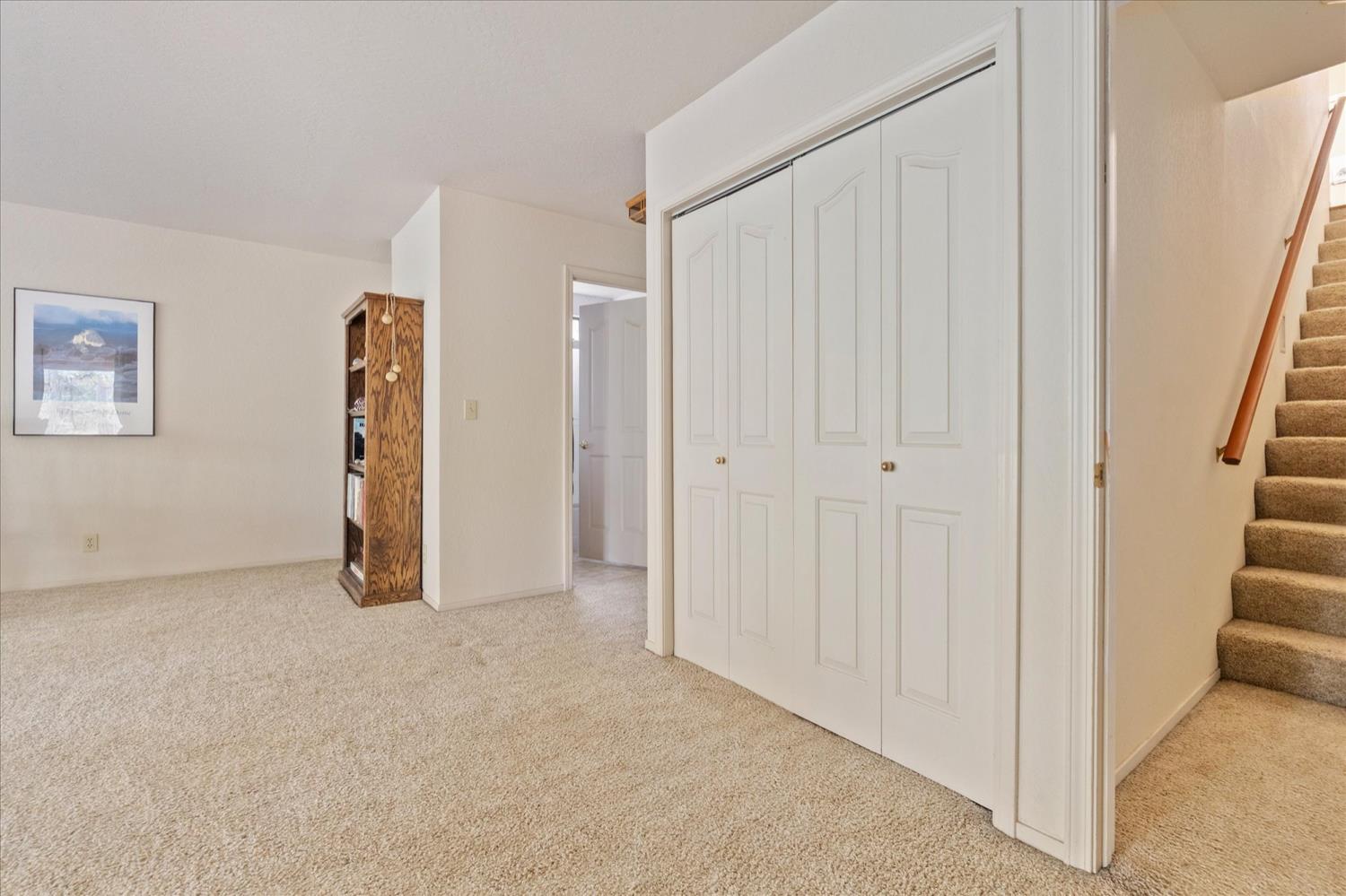 596 Sugarbush Lane Murphys, CA 95247 - Photo 34 of 48 a view of an empty room with stairs