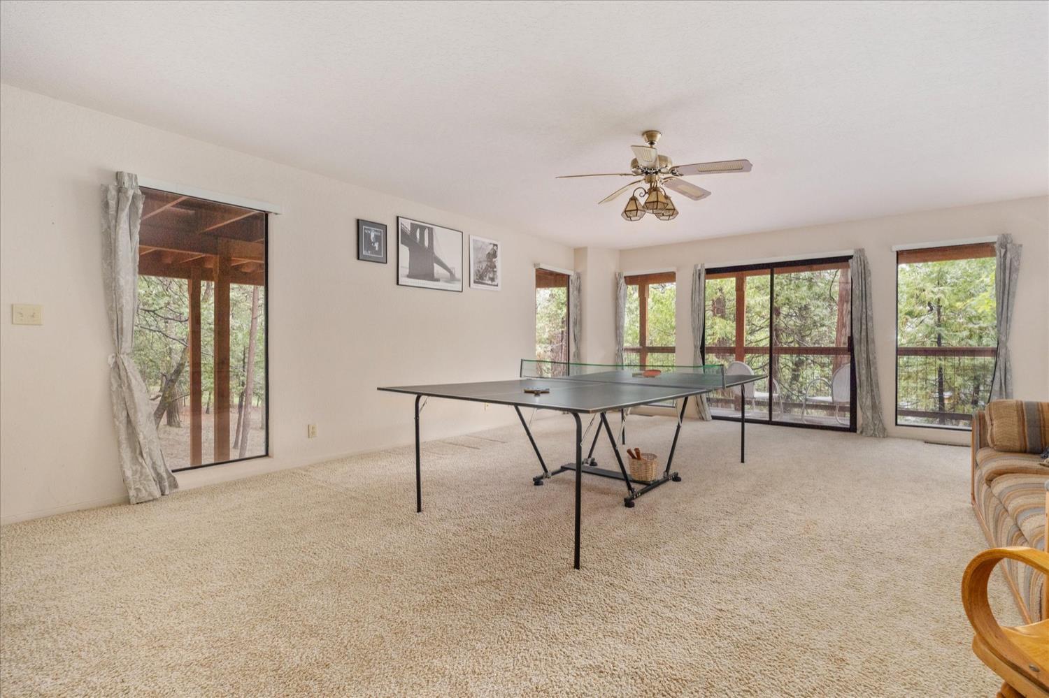 596 Sugarbush Lane Murphys, CA 95247 - Photo 37 of 48 a view of a livingroom with furniture and a window