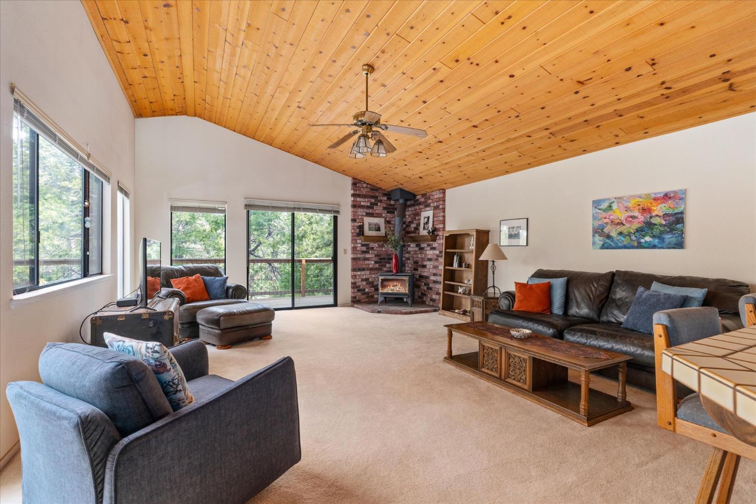 596 Sugarbush Lane Murphys, CA 95247 - Photo 4 of 48 a living room with furniture and a flat screen tv