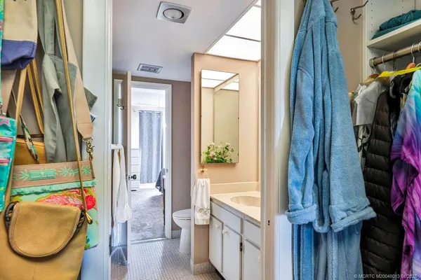 a bathroom with a toilet sink and tub