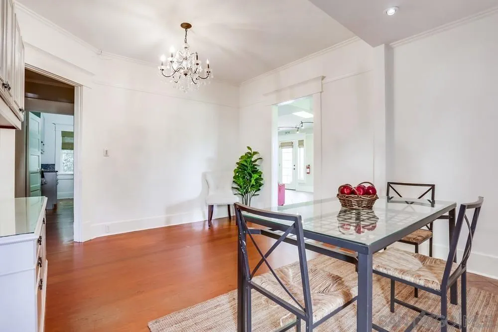 745 Main Street Ramona, CA 92065 - Photo 17 of 40 a dining room with furniture and chandelier