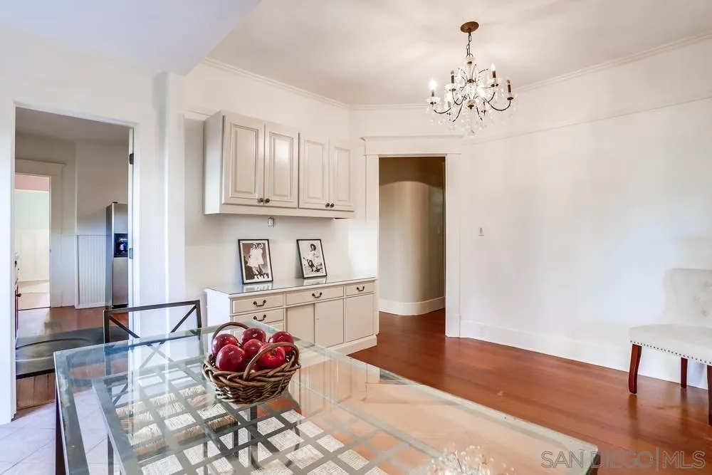 745 Main Street Ramona, CA 92065 - Photo 18 of 40 a living room with kitchen and chandelier
