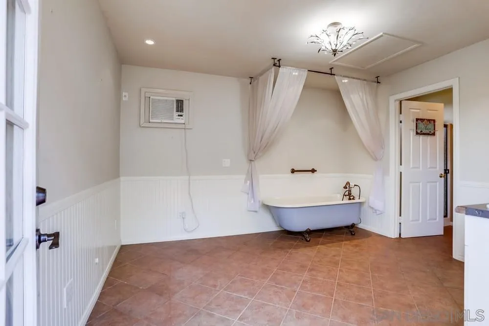 745 Main Street Ramona, CA 92065 - Photo 29 of 40 wooden floor that has three stainless steel appliances
